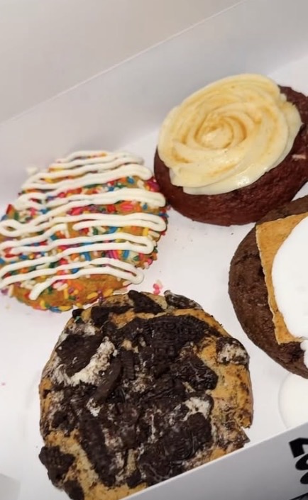 A box of assorted Night Owl Cookies flavors
